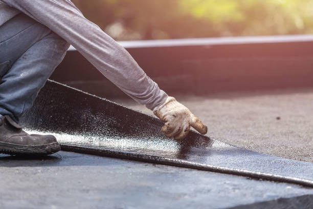 Professional Waterproofing technician working in Clayton, MI